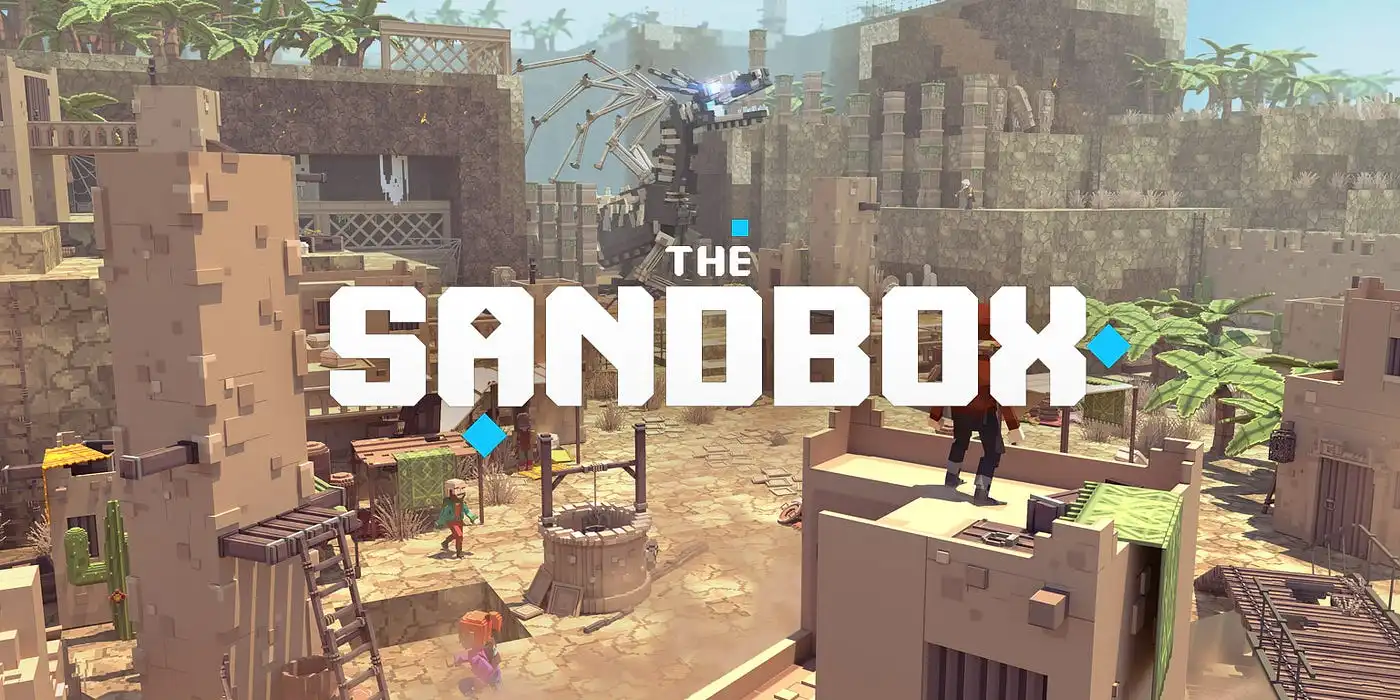 alt="Banner image of a popular play to earn game called The Sandbox"