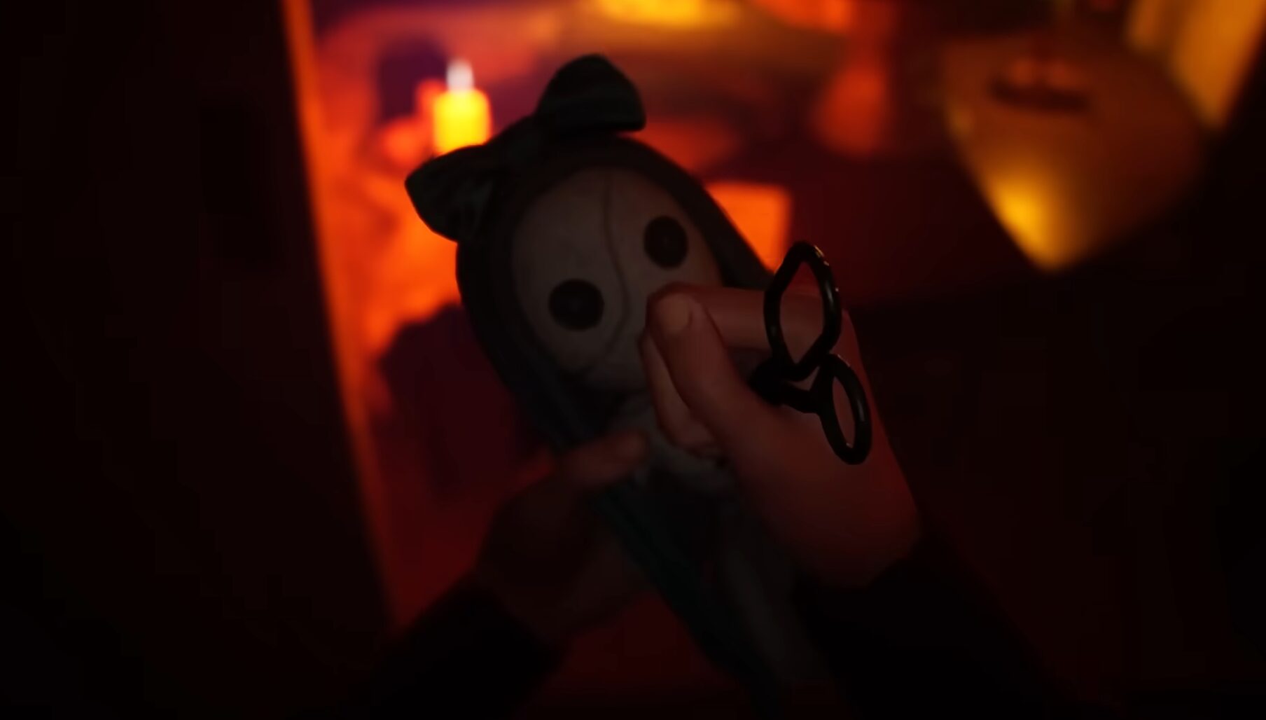 Putting scissors to a doll